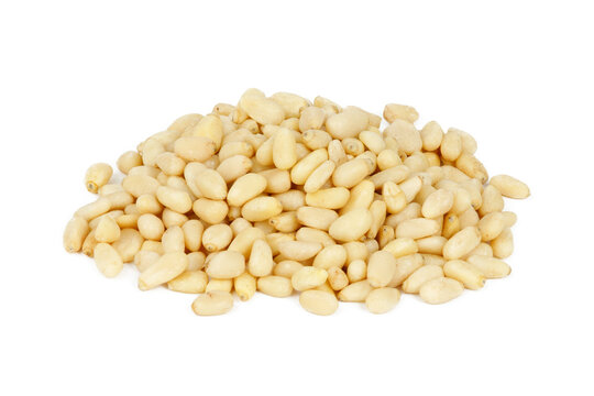 Bunch of pine nuts isolated on white background. Food rich in antioxidants.