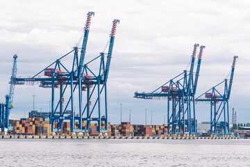 Cranes and containers at the port of Klaipeda, seaport located in Klaipeda, Lithuania, Baltic Sea....
