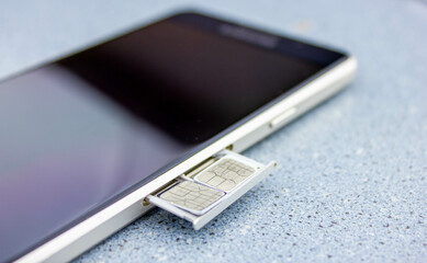 2 SIM cards smartphone close-up. Two SIM cards for installation in a smartphone.