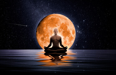 Man meditating in front of the moon