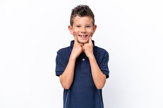 Little caucasian boy isolated on white background smiling with a happy and pleasant expression