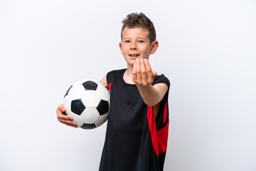 Little caucasian boy isolated on white background with soccer ball and doing coming gesture