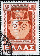 Elegant ancient amphora on greek postage stamp