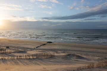 Scenic coastal landscape with sandy beach by the North Sea.	