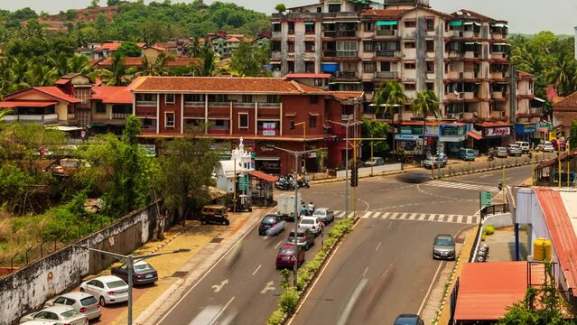 4K Timelapse footage of busy urban traffic at a junction displaying business traffic and commuters in morning or afternoon