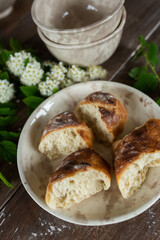 Fresh homemade baguette bread on wooden table. Healthy vegan eco food concept