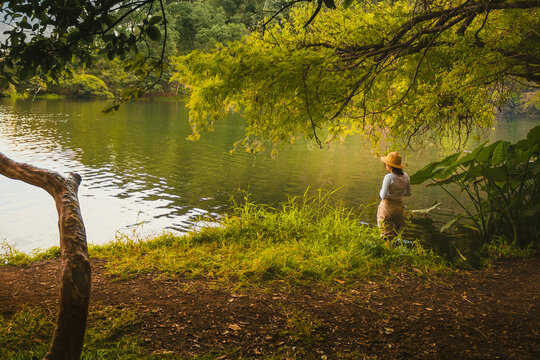 Girl in the volcanic pond