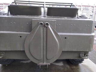 Military equipment, a close-up battle tank on a tracked track