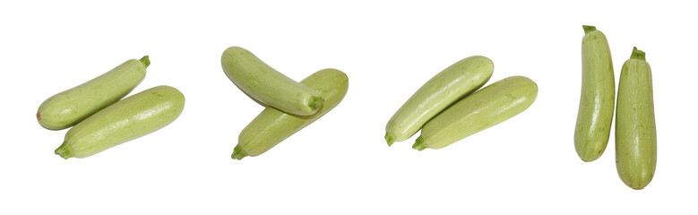 A set of zucchini of various shapes isolated on a white background.