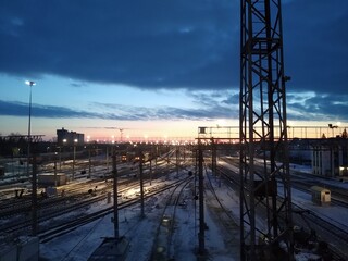 railway station from above at dawn with blue clouds