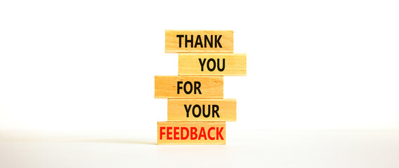 Thank you for feedback symbol. Concept words Thank you for your feedback on wooden blocks on a beautiful white table white background. Copy space. Business and thank you for feedback concept.