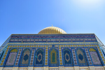 Beautiful mosque Dome of the rock situated on the temple mound in Jerusalem, Israel in a beautiful sunny day with blue sky.