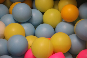 Plastic balls in colors of blue, red, green, yellow and orange