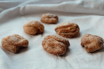 Bakery products. Homemade cookies with sugar on a towel background. Background image, copy space.