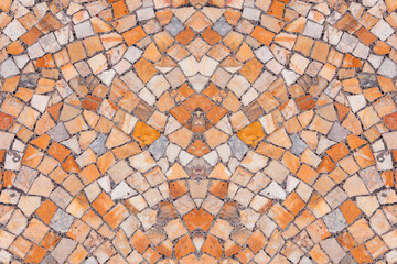Small red-orange tiles, arranged as a mosaic. Typical pavement of ancient churches.