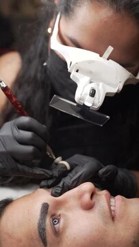 Male microblading procedure to making permanent eyebrows makeup