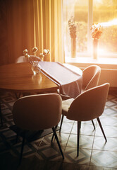 Interior of a cozy restaurant , reserved table with sunlight