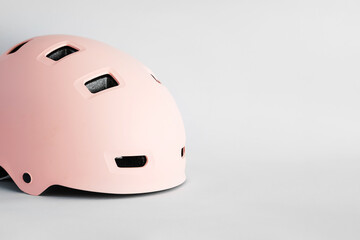 Pink helmet on WHITE background. Childs outdoors activity safety protection 