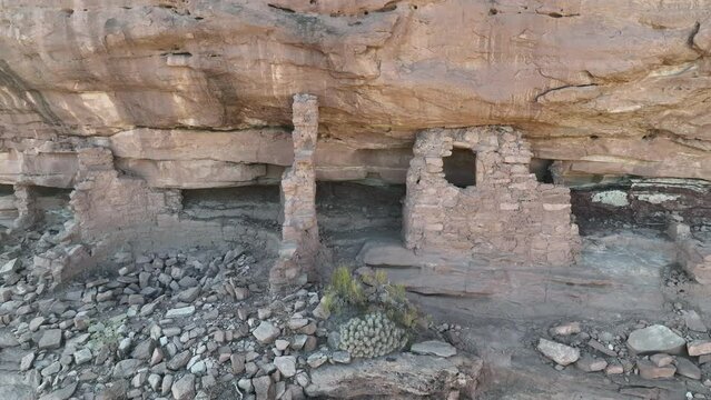 Aerial cliff Indian dwelling south Utah pan part 2. Montezuma Canyon southern Utah. Ancient native American, Indian dwelling, kiva, house, cliff dwelling, granary,  rock art, hieroglyphs.