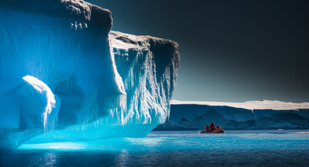 Scientists Explore Antarctic Icebergs by Boat © Stuart