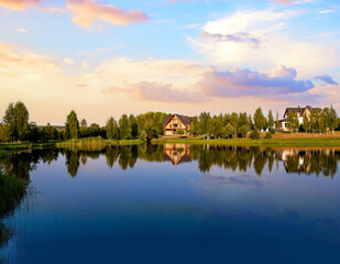 Fototapeta premium Beautiful summer sunset over the northern lake.