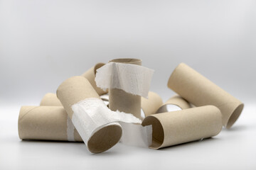 Sanitary and household, Used toilet paper roll lay stacked on white background, Empty brown tissue...
