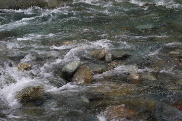 Stones in a flowing river