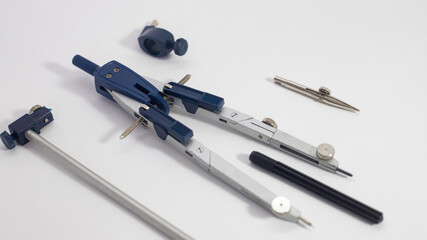 technical drawing compass on white paper with copy space