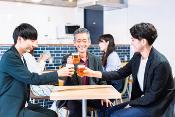 Businessmen having a launch party.