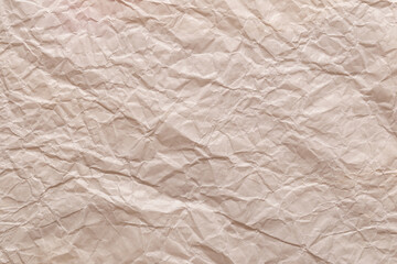 Grayish orange color wrinkled paper texture background.