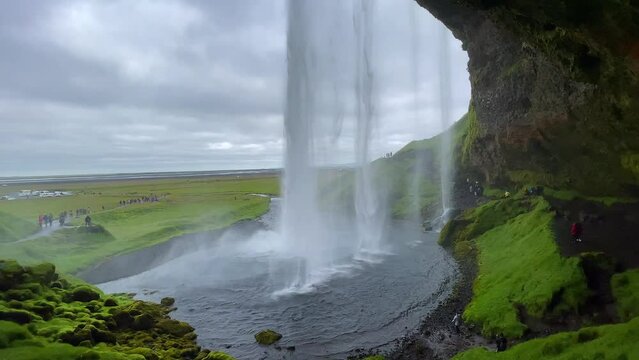 Beautiful aerial footage of the Seljalandsfoss and Gljufrabui waterfalls in Iceland on summer
