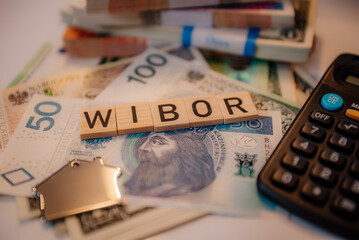 Napis wibor na tle banknotów © rozentuzjazmowany