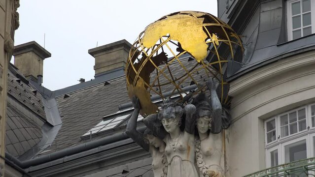 Globe on the roof of an ancient building. Vienna, Austria. 4K.