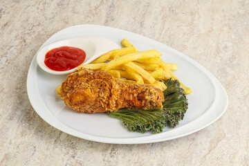 Crispy chicken leg with fry potato