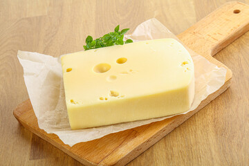 Maasdam cheese over the board