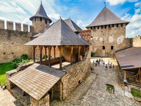 KHOTYN, UKRAINE - JULY 02, 2021, courtyard inside the Khotyn fortress. A group of tourists on an excursion.