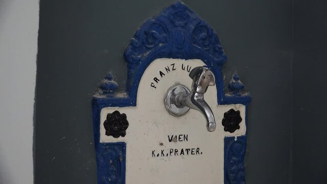 Ancient water tap. Vienna, Austria. 4K.