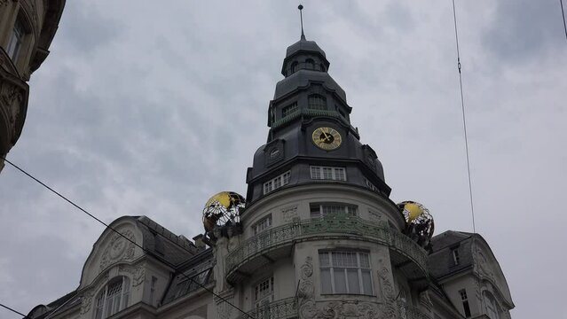 Globe on the roof of an ancient building. Vienna, Austria. 4K.