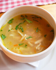 Soup with pasta in a restaurant