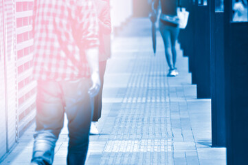Fototapeta premium people walking on the street