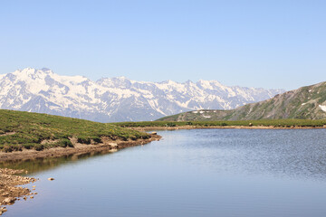Fototapeta na wymiar Lake Koruldi in the mountains of Svaneti, Georgia