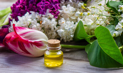Obraz na płótnie Canvas Essential oil from flowers. Spa. Selective focus