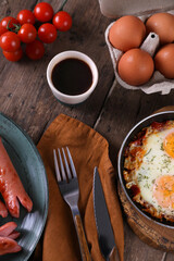 Breakfast with fried eggs and sausages