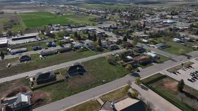 Aerial Monticello Utah city church part 2. Settled in July 1887 by pioneers from The Church of Jesus Christ of Latter-day Saints.  Uranium mine and refinery mill boom from the late 1940s.