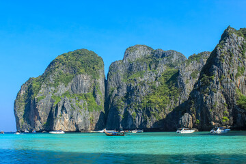 Boats at the beach at Maya bay at Phi Phi le, Phuket, Thailand