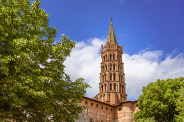View of Basilica of Saint Sernin bell tower mix of Romanesque and Gothic styles in Tolouse city France