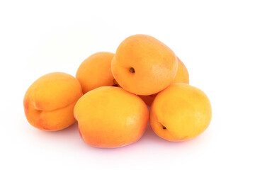 ripe apricots isolated on a white background