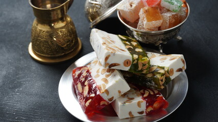 Assorted Turkish delights Rahat lokum. Colorful cubes of Turkish delights. Ramadan bayrami (eid al fitr) and Kurban bayrami (eid al adha) background photo.