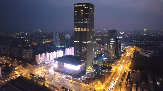 aerial view of modern building in midtown of jinhua at night

