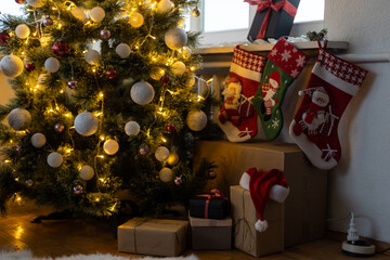 interior christmas. magic glowing tree, gifts
